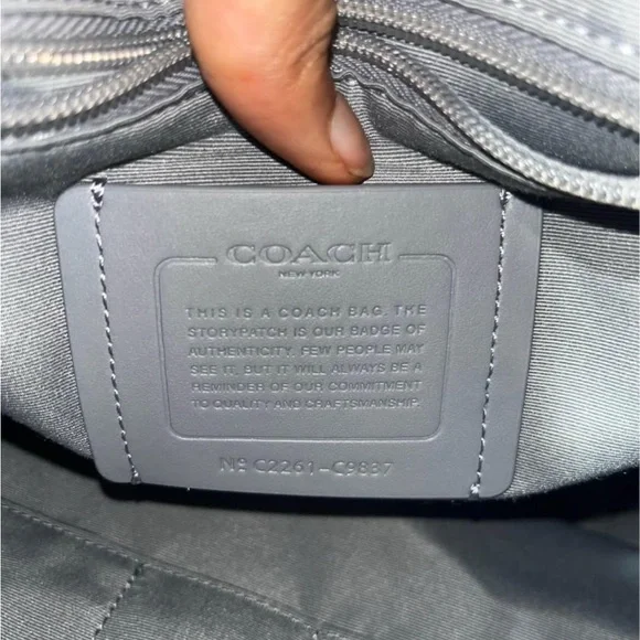 COACH multi colored men’s backpack